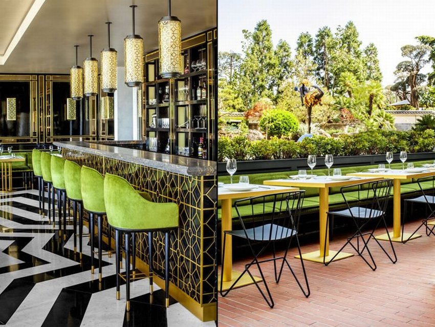 Thiết kế nội thất nhà hàng cao cấp với quầy bar sang trọng và ghế nỉ xanh. Thi công quán bar nhà hàng phong cách hiện đại với đèn trần trang trí tinh tế.