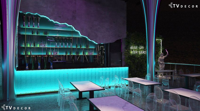Không gian quán cafe bar nổi bật với quầy bar ánh sáng xanh lam – tím mờ ảo, nội thất ghế trong suốt hiện đại và cách bố trí mở. Phù hợp mô hình bar trẻ trung, phong cách nghệ thuật đương đại và chụp ảnh sống ảo.