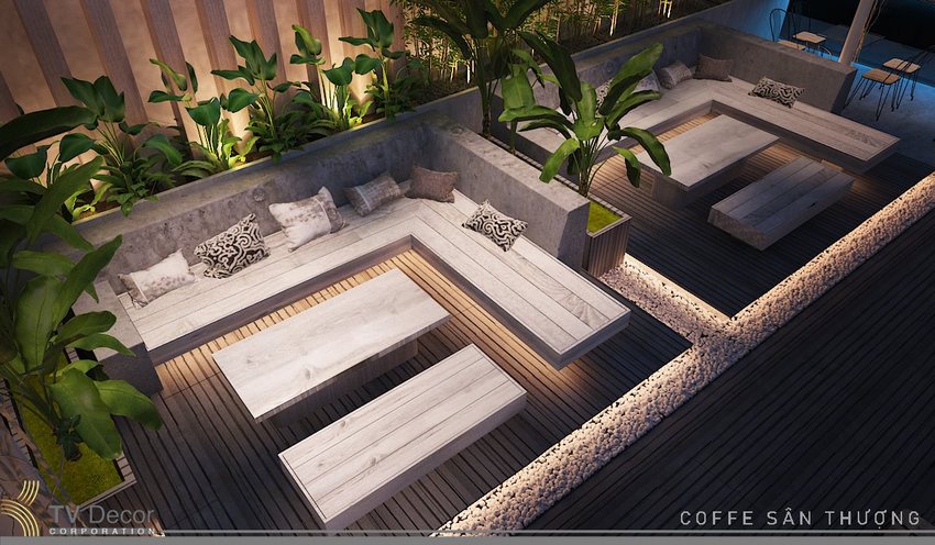 Thiết kế thi công cafe sân thượng hiện đại với khu ghế ngồi sofa bê tông tối giản, bàn gỗ tinh tế kết hợp cây xanh, tạo không gian thư giãn thoải mái