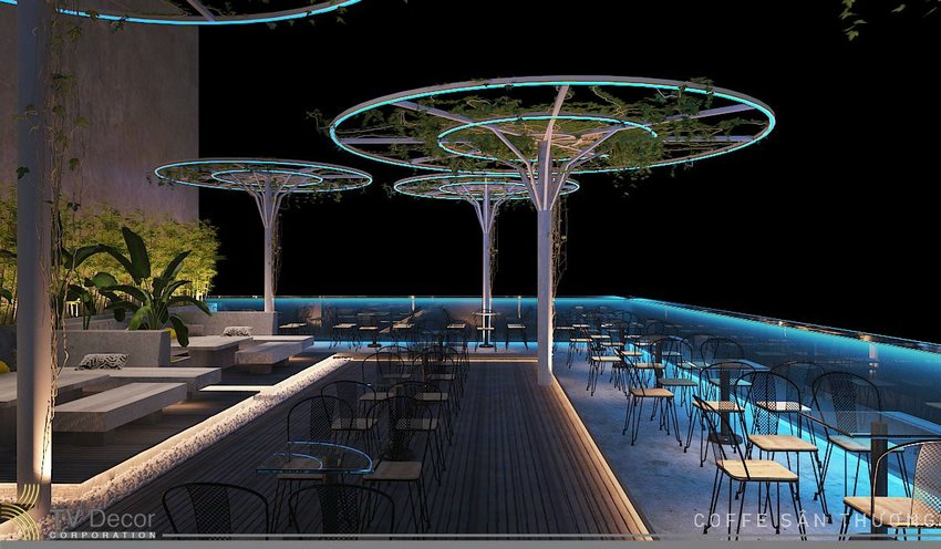 Thiết kế thi công quán cafe sân thượng ấn tượng với không gian mở, kết hợp ánh sáng hiện đại và cây xanh, mang đến trải nghiệm thư giãn lý tưởng cả ngày lẫn đêm.