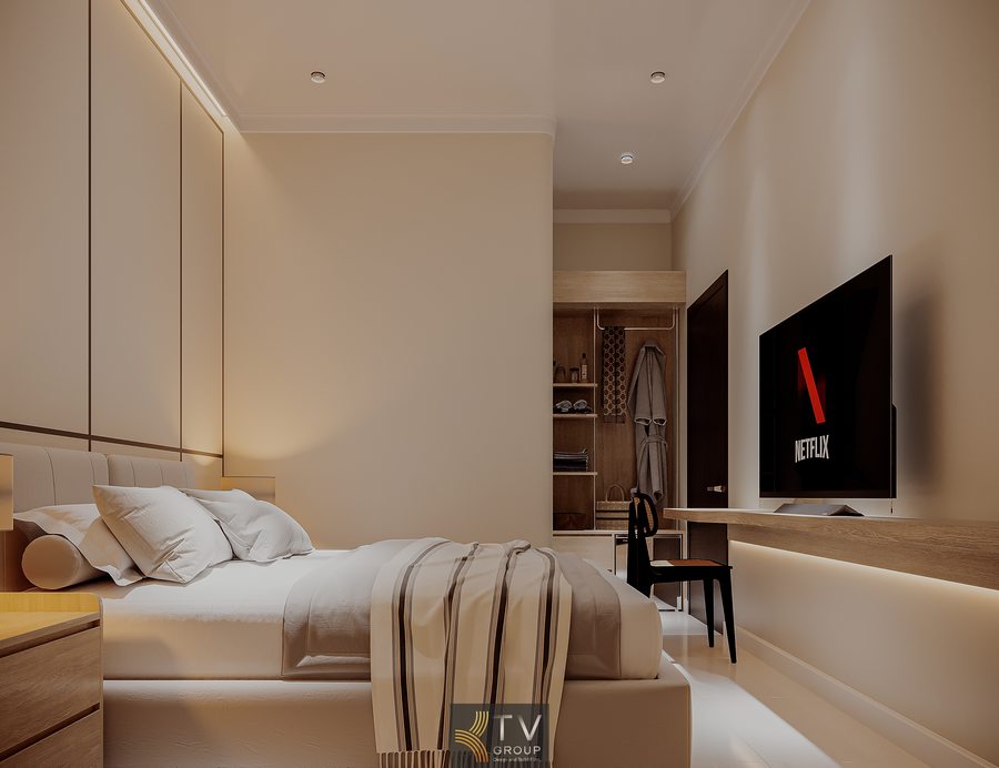 Phòng khách sạn nhỏ phong cách tối giản với nội thất gỗ sáng, ánh sáng ấm và bố trí khoa học giúp tối ưu diện tích và trải nghiệm sử dụng