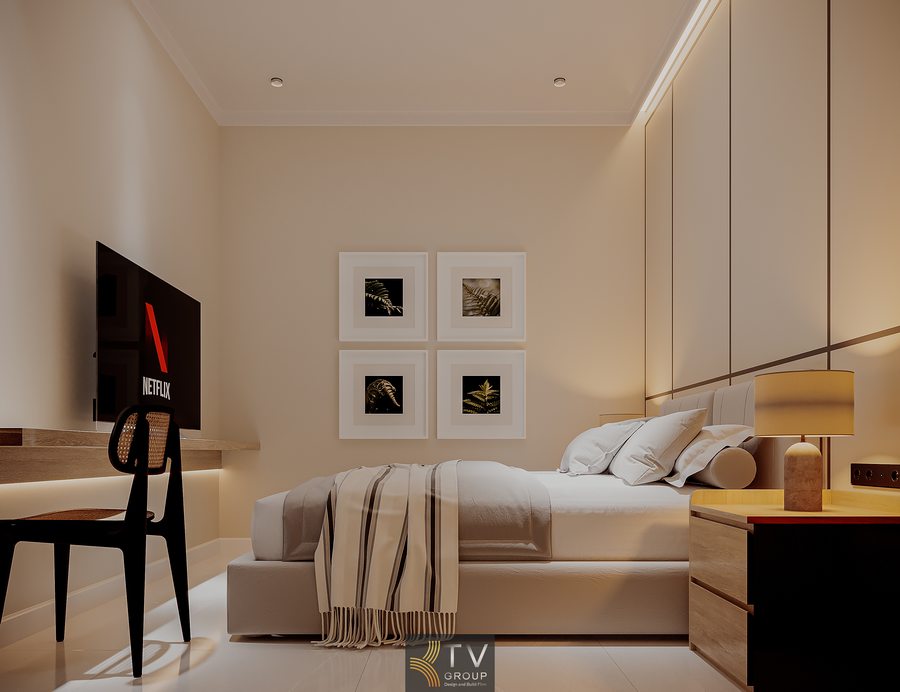 Không gian khách sạn hiện đại với giường đơn giản, bàn treo và tủ âm tường giúp tiết kiệm diện tích và tăng công năng