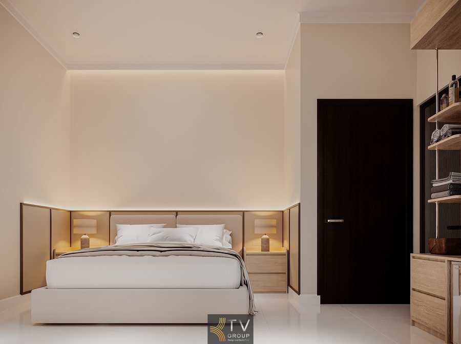 Phòng khách sạn tối giản với tông sáng, nội thất gọn gàng và ánh sáng gián tiếp tạo cảm giác rộng rãi và dễ chịu