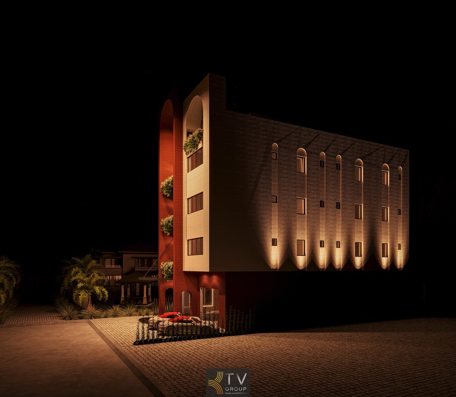 Mặt tiền khách sạn với ánh sáng vàng tạo điểm nhấn nổi bật ban đêm