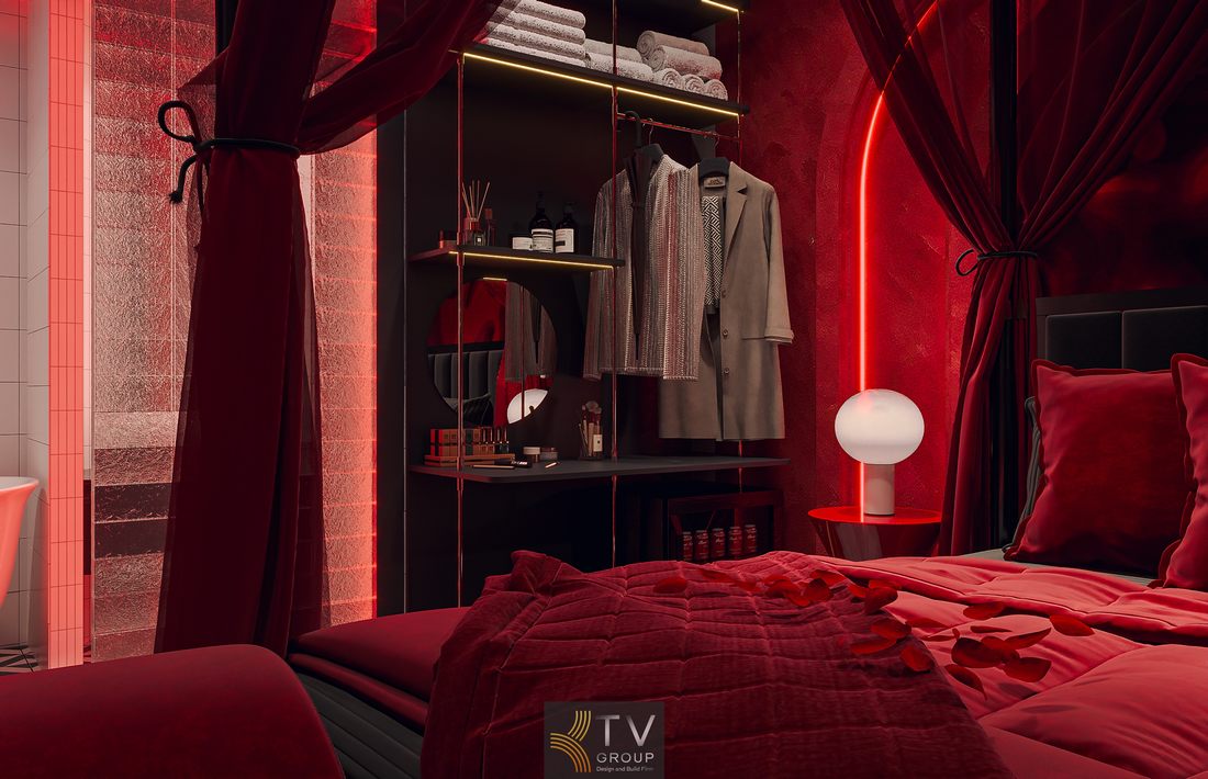 Thiết kế thi công phòng khách sạn ánh sáng ấm với giường trung tâm và nội thất hiện đại, tạo không gian riêng tư tinh tế phù hợp mô hình kinh doanh lưu trú hiệu quả