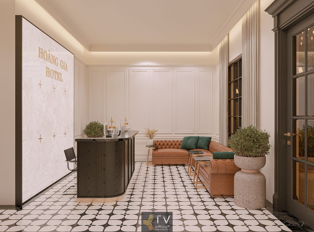 Không gian lễ tân khách sạn thiết kế tân cổ điển với quầy gỗ tối màu, sofa da nâu kết hợp ánh sáng vàng dịu nhẹ mang lại cảm giác cao cấp, tinh tế và tăng giá trị nhận diện thương hiệu 