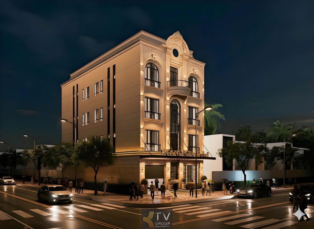 Công trình khách sạn với cửa vòm và ban công trung tâm Thiết kế khách sạn cao cấp với ánh sáng ban đêm