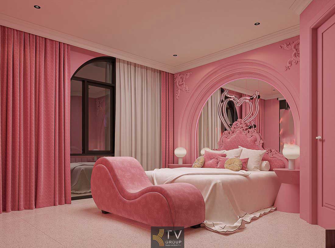 Thi công phòng khách sạn chủ đề lãng mạn với giường trung tâm bo cong, ánh sáng ấm và nội thất cao cấp thu hút khách