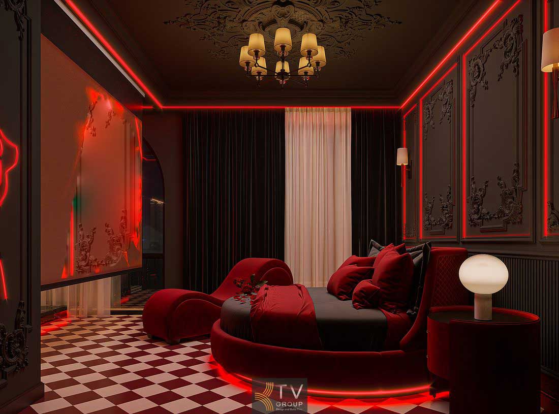 Thiết kế phòng khách sạn với hệ đèn LED âm tường, giường trung tâm và nội thất đồng bộ mang lại trải nghiệm lưu trú cao cấp