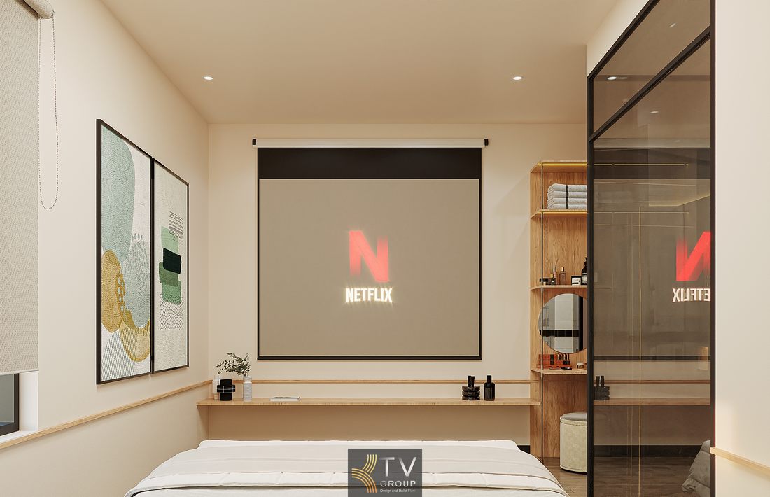 Không gian phòng ngủ khách sạn với giường bọc nệm và ánh sáng ấm