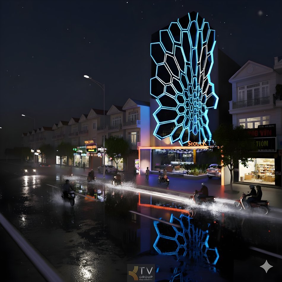 Mặt tiền karaoke phong cách futuristic sử dụng hệ khung LED lớn chạy dọc tòa nhà, tạo điểm nhấn kiến trúc nổi bật trong khu vực giải trí. 