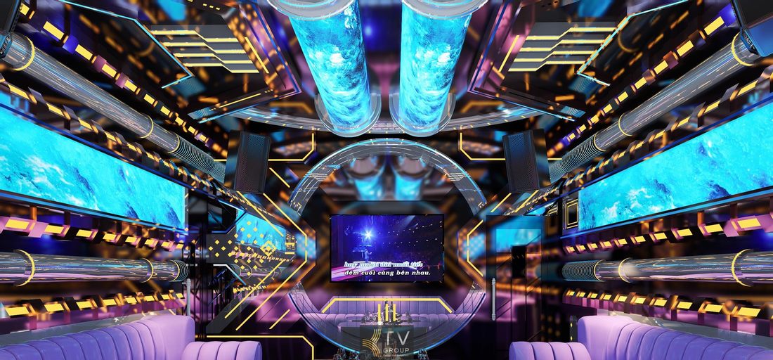 Thiết kế phòng karaoke KTV tại Tây Ninh phong cách futuristic với trần LED, màn hình trung tâm lớn và hệ ánh sáng công nghệ cao, tạo không gian giải trí ấn tượng và trải nghiệm âm nhạc sống động. 