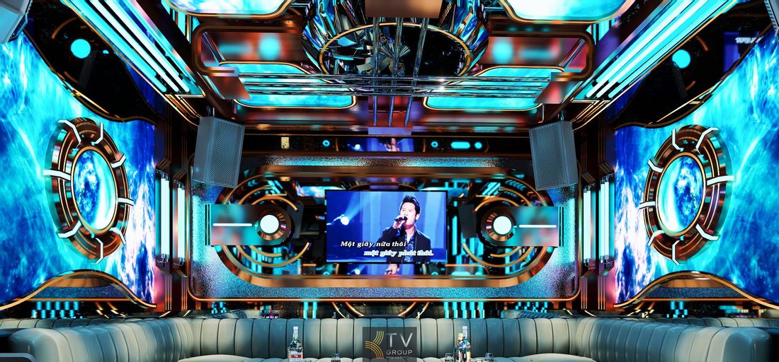 Thiết kế phòng karaoke KTV tại Tây Ninh với trần LED hiện đại, màn hình karaoke trung tâm và nội thất sofa dài sang trọng, tạo không gian giải trí âm nhạc chuyên nghiệp. 