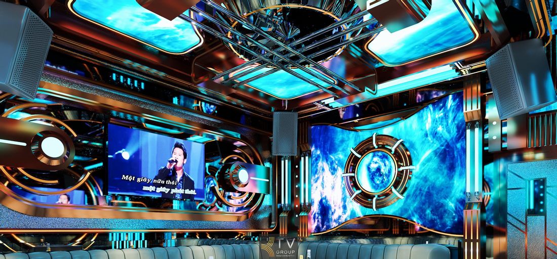 Nội thất phòng karaoke tại Tây Ninh phong cách công nghệ cao với hệ ánh sáng LED, màn hình lớn và bố cục sofa bao quanh, mang lại trải nghiệm hát karaoke hiện đại. 