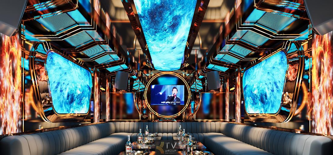 Thiết kế phòng karaoke KTV tại Tây Ninh với trần LED nghệ thuật, màn hình trung tâm và nội thất sofa bao quanh, tạo không gian giải trí hiện đại và trải nghiệm âm nhạc sống động. 