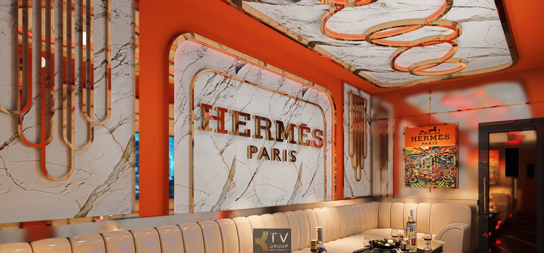 Thiết kế nội thất karaoke phong cách Hermès Paris với tông cam kết hợp marble, sofa cao cấp và ánh sáng gián tiếp giúp không gian nhỏ trở nên rộng và sang trọng hơn.