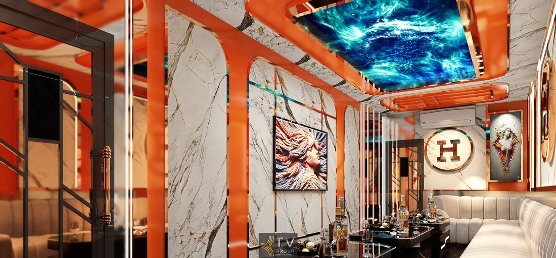 Không gian karaoke Hermès Paris với tông cam đặc trưng, khung kim loại ánh vàng, tường marble và trần LED hiệu ứng vũ trụ mang lại trải nghiệm giải trí cao cấp. v