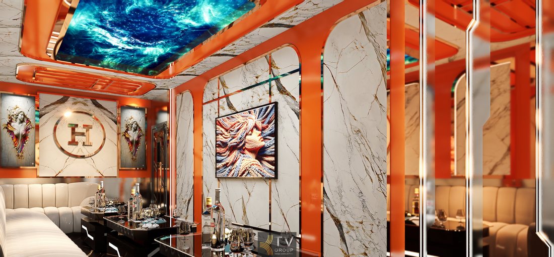 Mẫu phòng karaoke KTV Hermès Paris kết hợp trần LED galaxy, logo chữ H nổi bật, nội thất sofa dài và ánh sáng LED đa lớp tạo không gian hiện đại. 