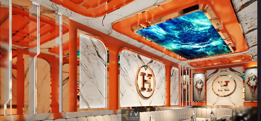 Thiết kế nội thất karaoke phong cách Hermès Paris với marble trắng vân tự nhiên, ánh sáng gián tiếp và trần LED chuyển động giúp không gian thêm sinh động. 