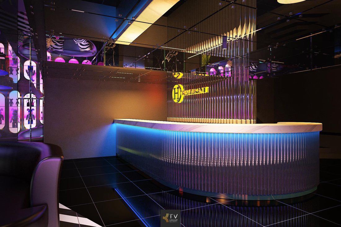 Sảnh karaoke KTV hiện đại với hệ đèn LED đa lớp, ghế lounge sang trọng và không gian mở giúp nâng cao trải nghiệm khách hàng cao cấp.