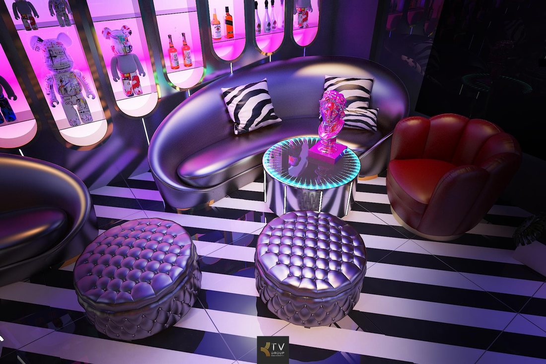 Không gian đón khách karaoke futuristic với ánh sáng đổi màu, thiết kế trần độc đáo và khu vực chờ sang trọng tăng trải nghiệm khách hàng.