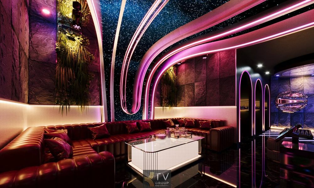 Khu jacuzzi spa cao cấp với bồn tắm lớn, ánh sáng đỏ neon và thiết kế nội thất hiện đại mang đến trải nghiệm thư giãn chuyên sâu cho khách hàng VIP