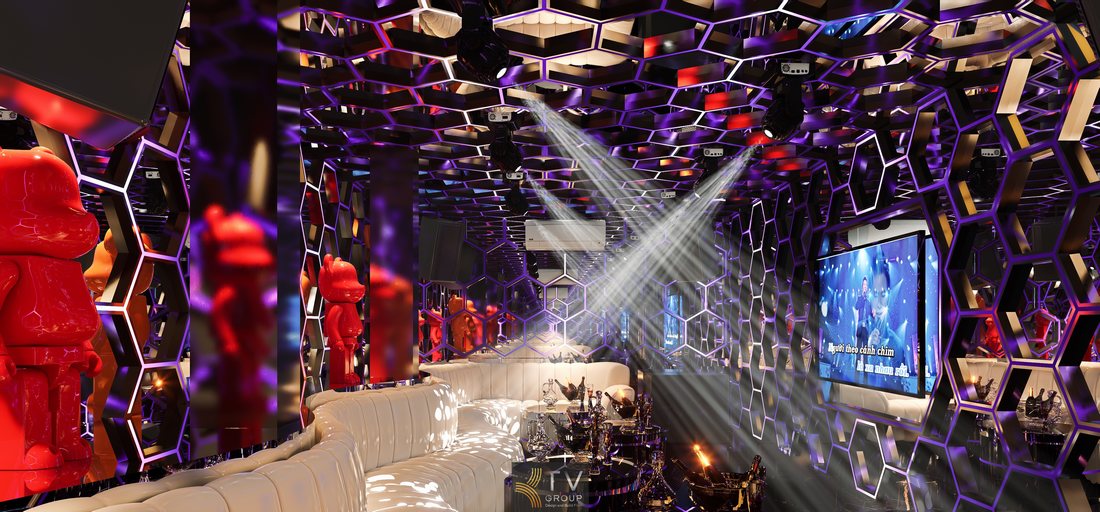 Thiết kế nội thất karaoke phong cách tương lai với hệ trần tổ ong kết hợp ánh sáng LED, bố trí ghế sofa sang trọng và không gian mở giúp tăng trải nghiệm khách hàng và hiệu quả kinh doanh 