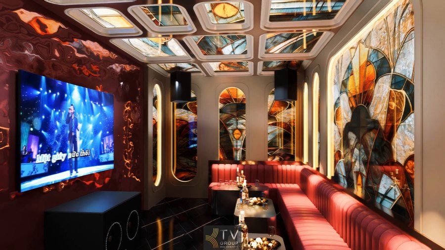 Không gian thi công karaoke Long An sử dụng vật liệu cao cấp, trần trang trí kính nghệ thuật và nội thất sofa đỏ tạo điểm nhấn sang trọng hiện đại 