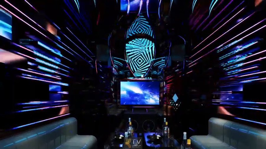 Mẫu thiết kế KTV hiện đại tại Tây Ninh phong cách futuristic, sử dụng LED đa màu, hiệu ứng ánh sáng chuyển động và nội thất cao cấp. 