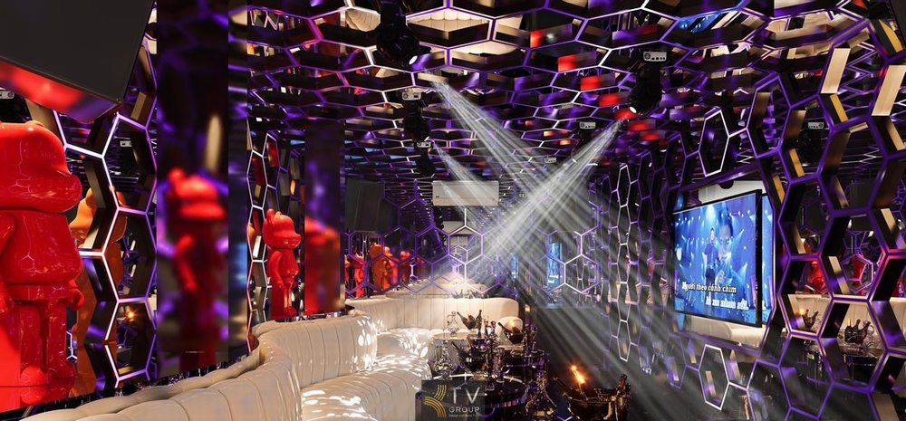Mẫu phòng karaoke đẹp với hệ thống ánh sáng hiện đại và thiết kế nội thất sang trọng cho quán karaoke kinh doanh.  19. Thiết kế phòng karaoke KTV hiện đại với tường trang trí nghệ thuật và ánh sáng LED tạo không gian giải trí ấn tượng. 