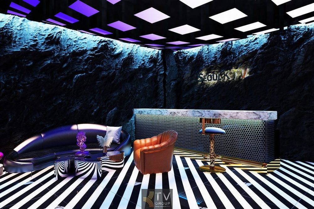 . Thiết kế phòng karaoke sang trọng với trần trang trí ánh sáng nghệ thuật, sofa karaoke cao cấp và màn hình lớn tạo không gian giải trí hiện đại. 