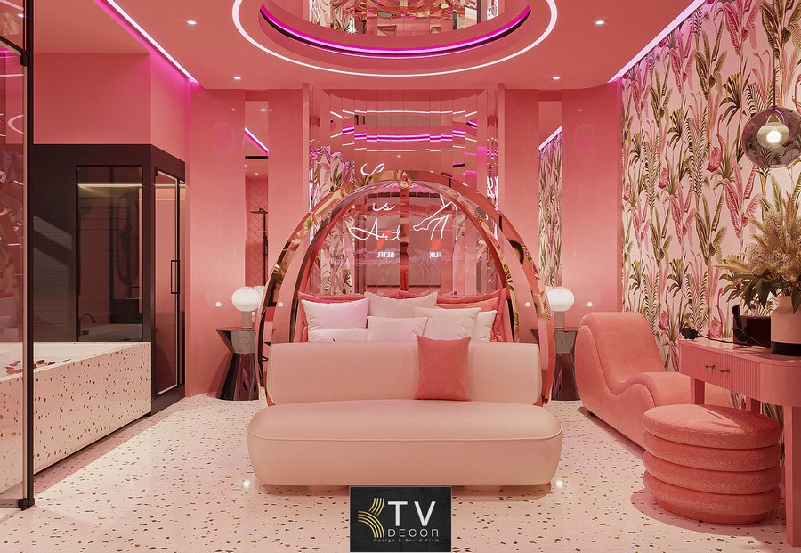 Thiết kế thi công phòng khách sạn chủ đề tình yêu phong cách Hồng Pastel Hiện Đại, nổi bật với hệ ánh sáng LED hồng – trắng, giường tròn và bố cục không gian đầy tính nghệ thuật.