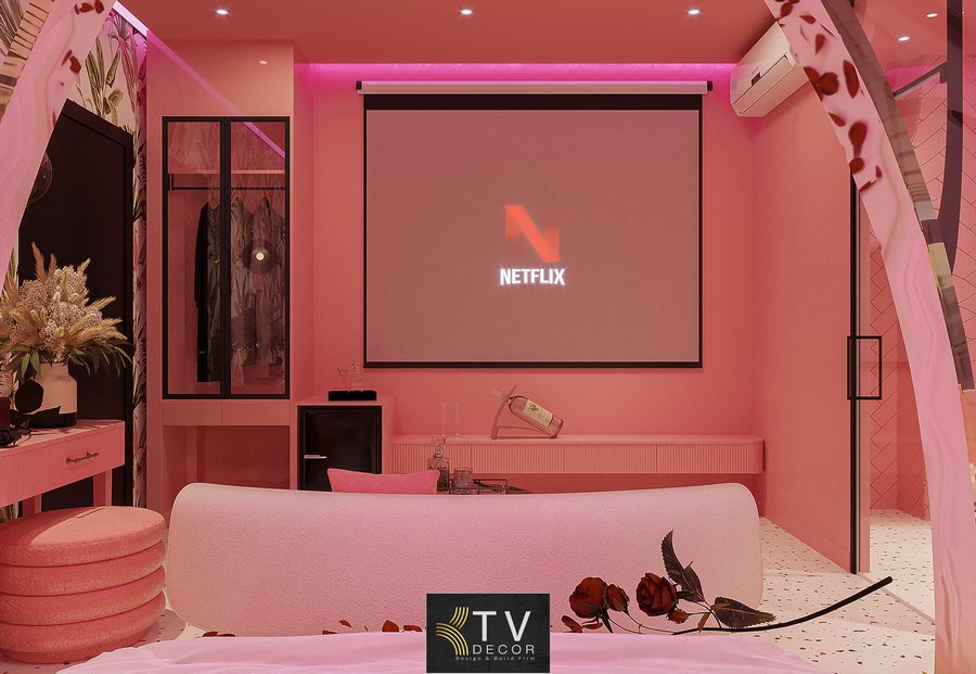 Thiết kế thi công phòng khách sạn chủ đề tình yêu phong cách Hồng Pastel Hiện Đại, nổi bật với hệ ánh sáng LED hồng – trắng, giường tròn và bố cục không gian đầy tính nghệ thuật.