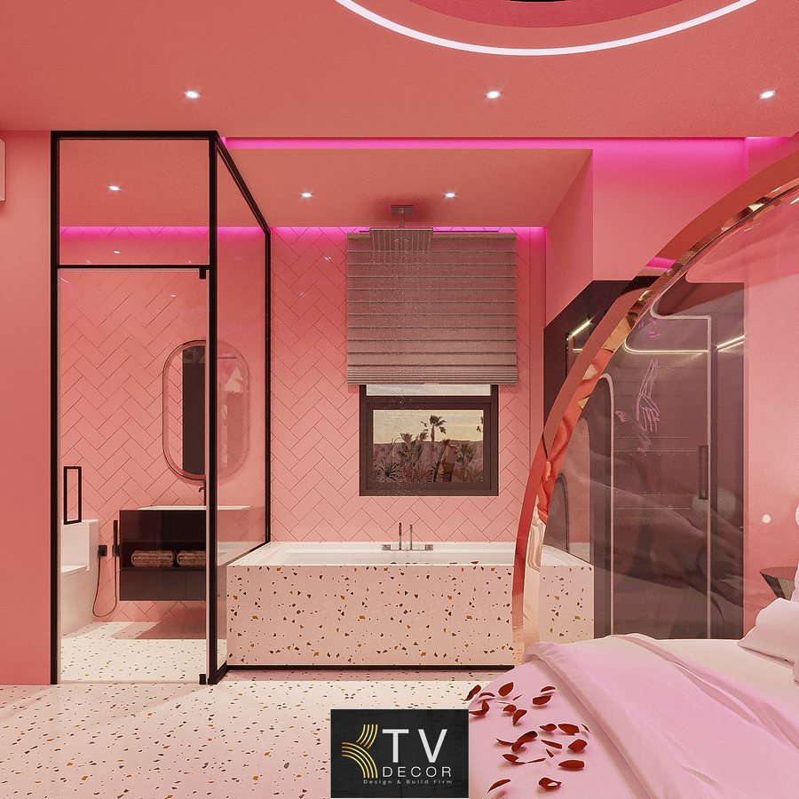 Thiết kế thi công phòng khách sạn phong cách Hồng Pastel Hiện Đại do KTV Group thực hiện. Diện tích 28–35m² với giường tròn nổi bật, ánh sáng LED hồng đa tầng