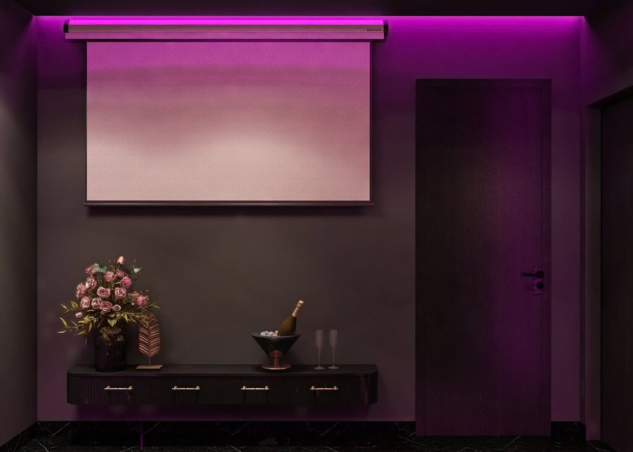 phòng khách sạn chủ đề lãng mạn phong cách hiện đại nghệ thuật với đèn led hồng và giường tròn sang trọng