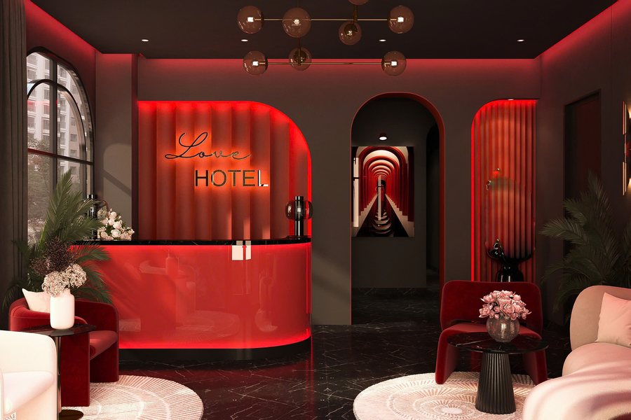 Không gian lễ tân khách sạn hiện đại phong cách lãng mạn, phối màu đỏ quyền lực – đen huyền bí cùng ánh sáng LED tinh chỉnh theo xu hướng 2025–2026