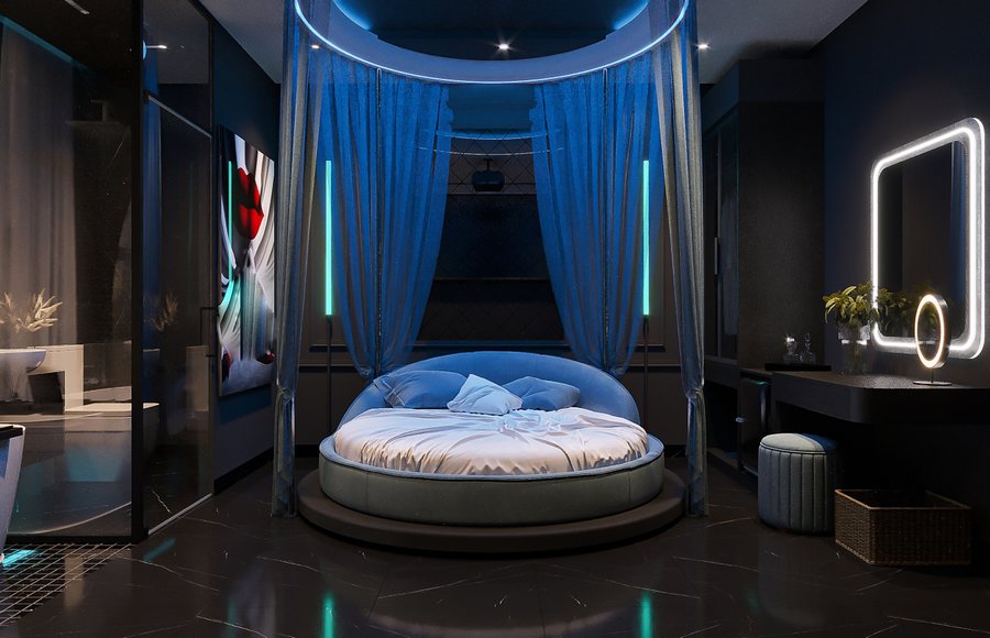 Khám phá phòng khách sạn Midnight Blue Glow – Không gian chủ đề lãng mạn hiện đại với giường tròn, rèm buông xanh và hiệu ứng ánh sáng nghệ thuật