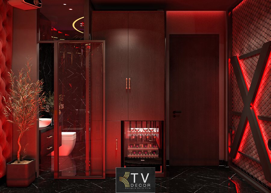 Thiết kế phòng khách sạn chủ đề tình yêu phong cách Luxury Romantic với giường tròn, ánh sáng đỏ ấm và chi tiết nội thất nghệ thuật.