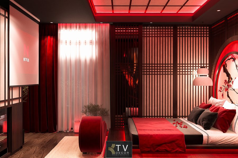 Không gian phòng khách sạn phong cách Nhật hiện đại với bố cục tinh gọn, ánh sáng đỏ ấm, chi tiết gỗ nan và hệ thống giải trí cao cấp do KTV GROUP thực hiện 2