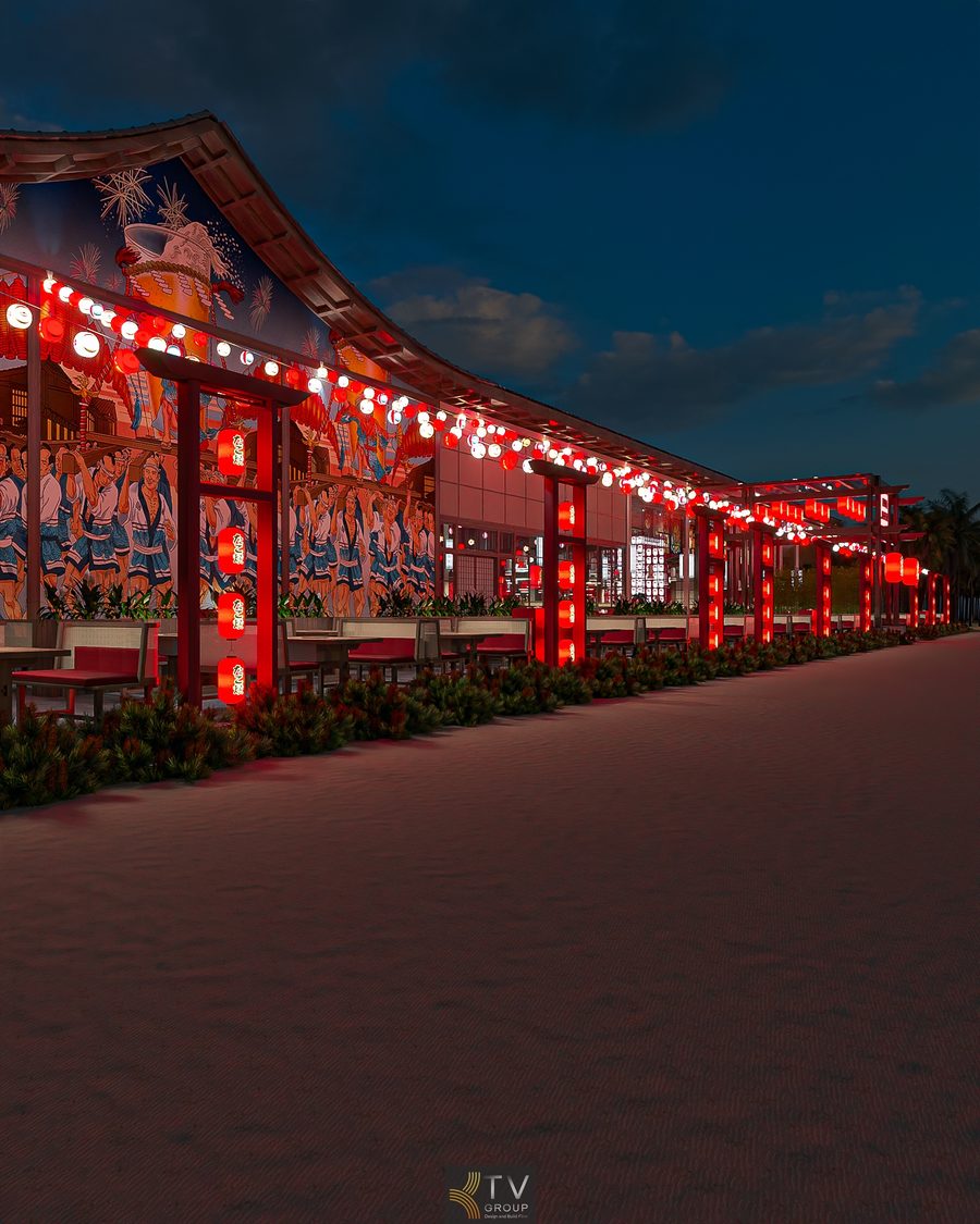 Không gian mặt tiền dãy nhà hàng BBQ Japan Garden được thiết kế nổi bật với phong cách Nhật Bản truyền thống kết hợp hiện đại. Hệ khung cột đỏ chạy dài tạo nhịp điệu kiến trúc rõ ràng, dẫn hướng ánh nhìn xuyên suốt toàn bộ khu vực.