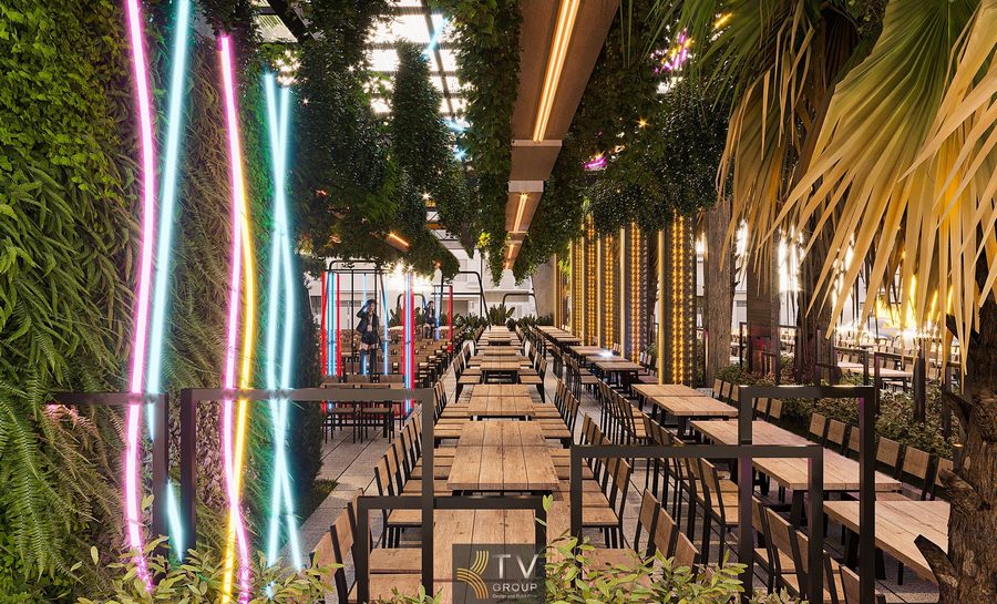 Thiết kế Beer Garden kết hợp ánh sáng ấm cho khu vực bàn khách Beer Garden quy mô lớn tại TPHCM được chiếu sáng đồng bộ theo tuyến kiến trúc