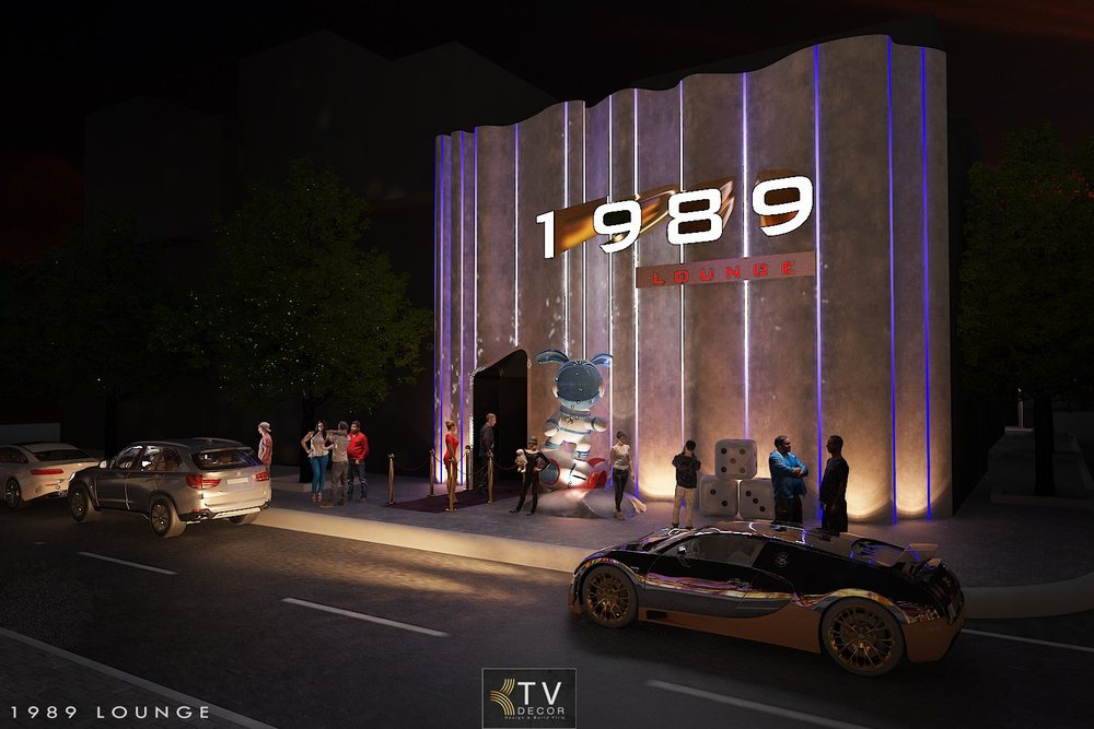 Toàn cảnh mặt tiền 1989 Lounge phong cách hiện đại, có đèn LED tím, mô hình phi hành gia, do KTV DECOR thiết kế và thi công.
