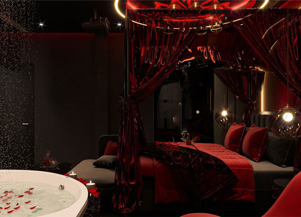 Thiết kế phòng khách sạn chủ đề tình yêu với không gian đỏ đen sang trọng
